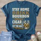 Blue t-shirt with text: Stay Home Drink Bourbon Smoke Cigar And Pet The Dog.