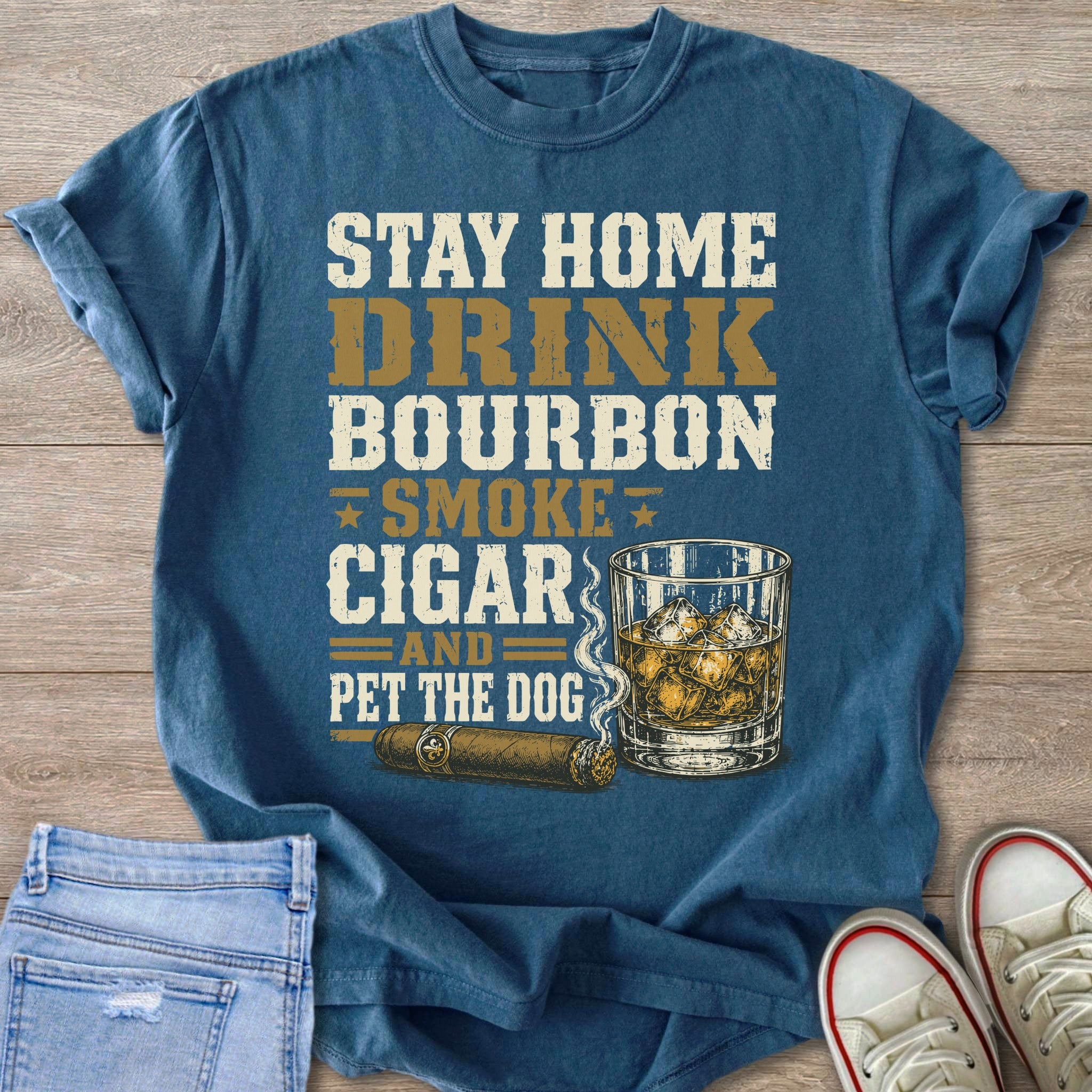 Blue t-shirt with text: Stay Home Drink Bourbon Smoke Cigar And Pet The Dog.