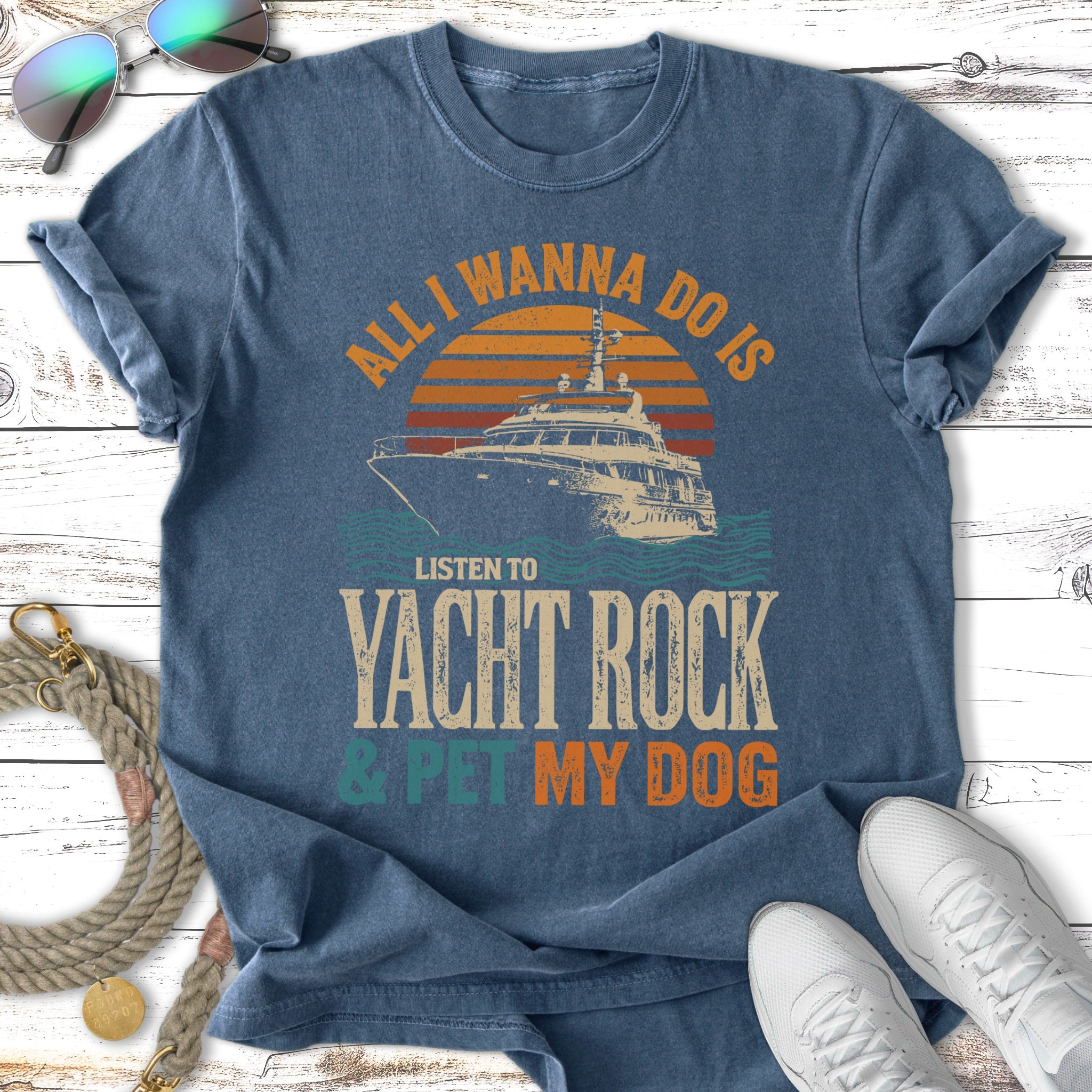 Distressed t-shirt with yacht, sunset, and text "All I wanna do is listen to Yacht Rock & pet my dog."