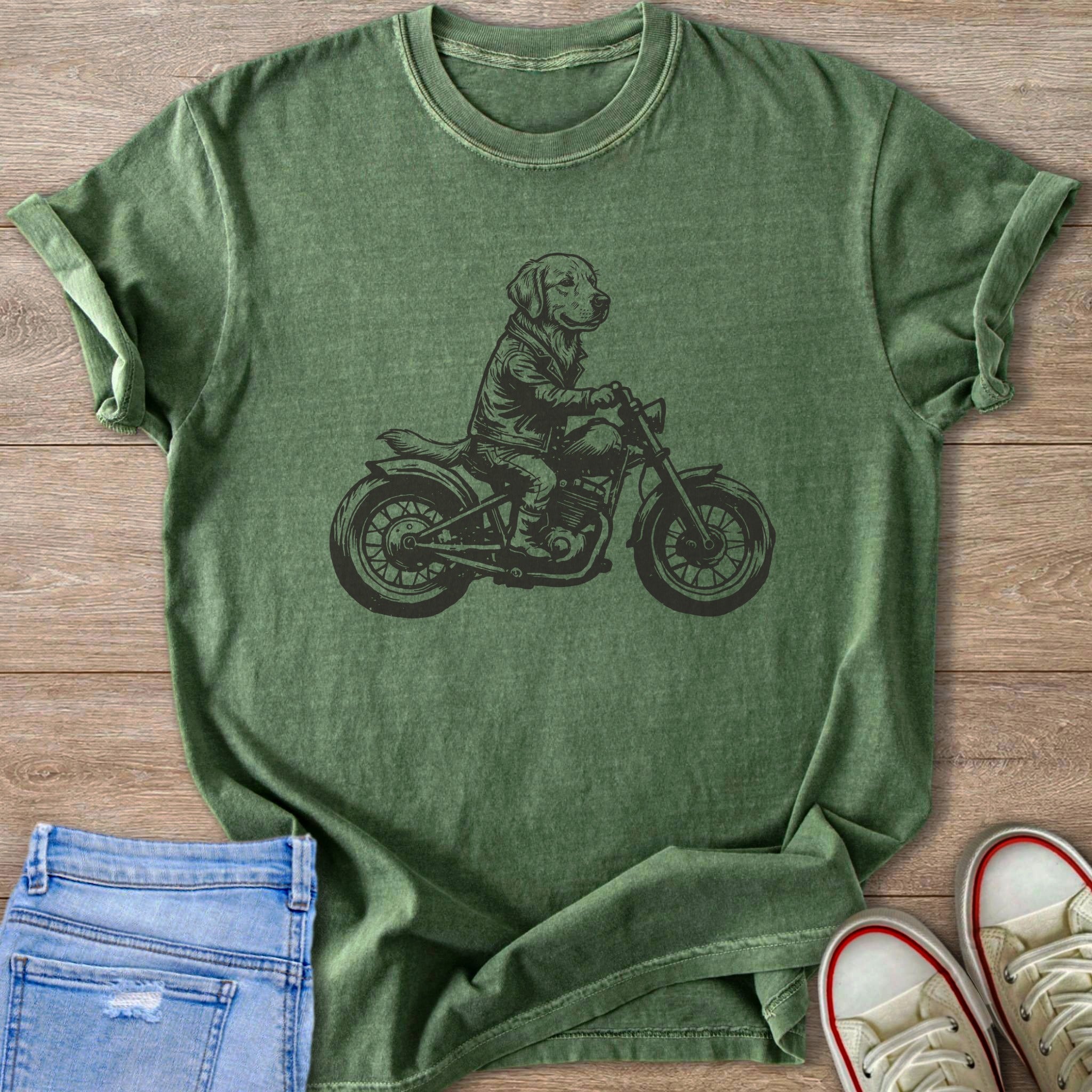 Green t-shirt with graphic of a dog riding a motorcycle.