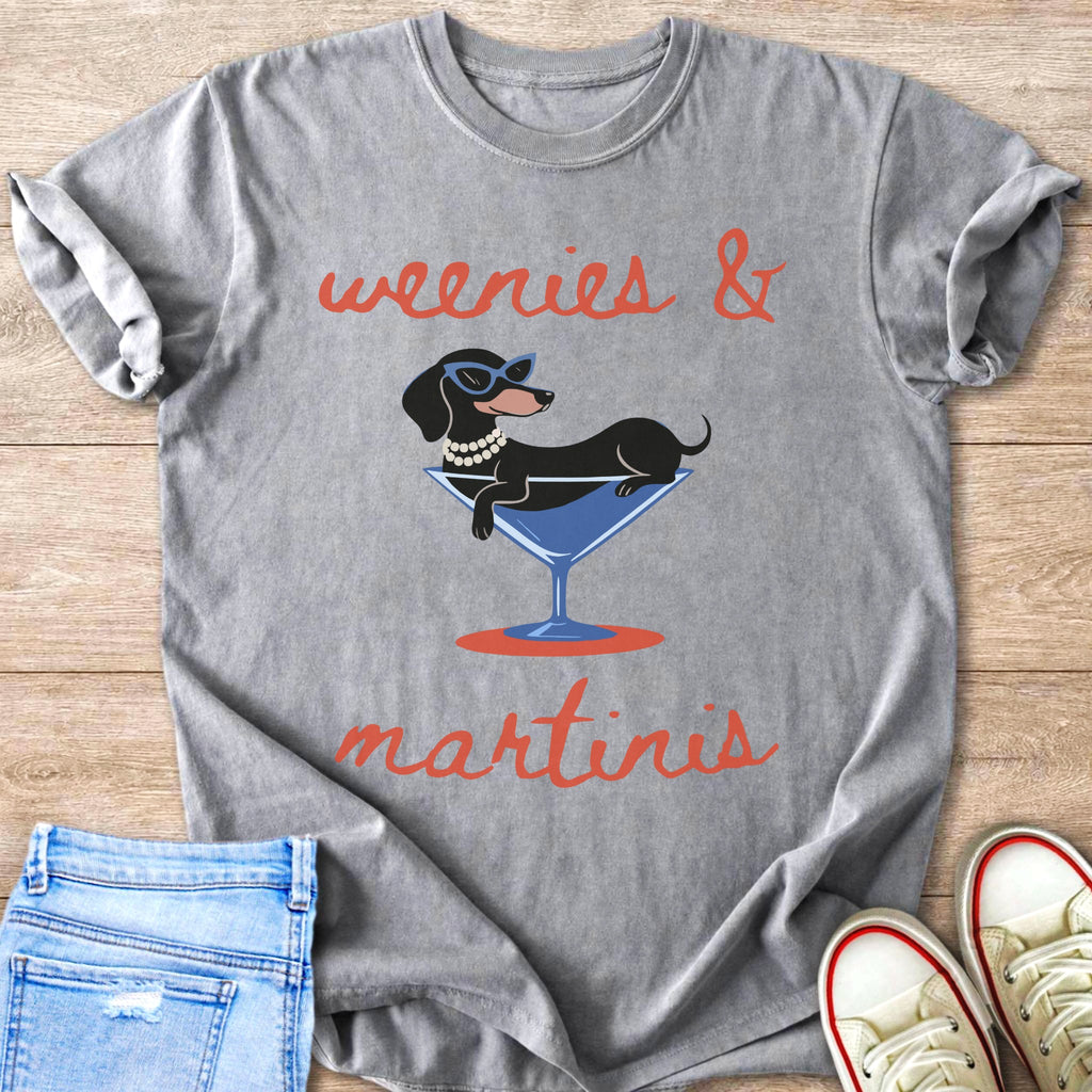 Grey t-shirt with text "weenies & martinis" and graphic of dachshund in martini glass.