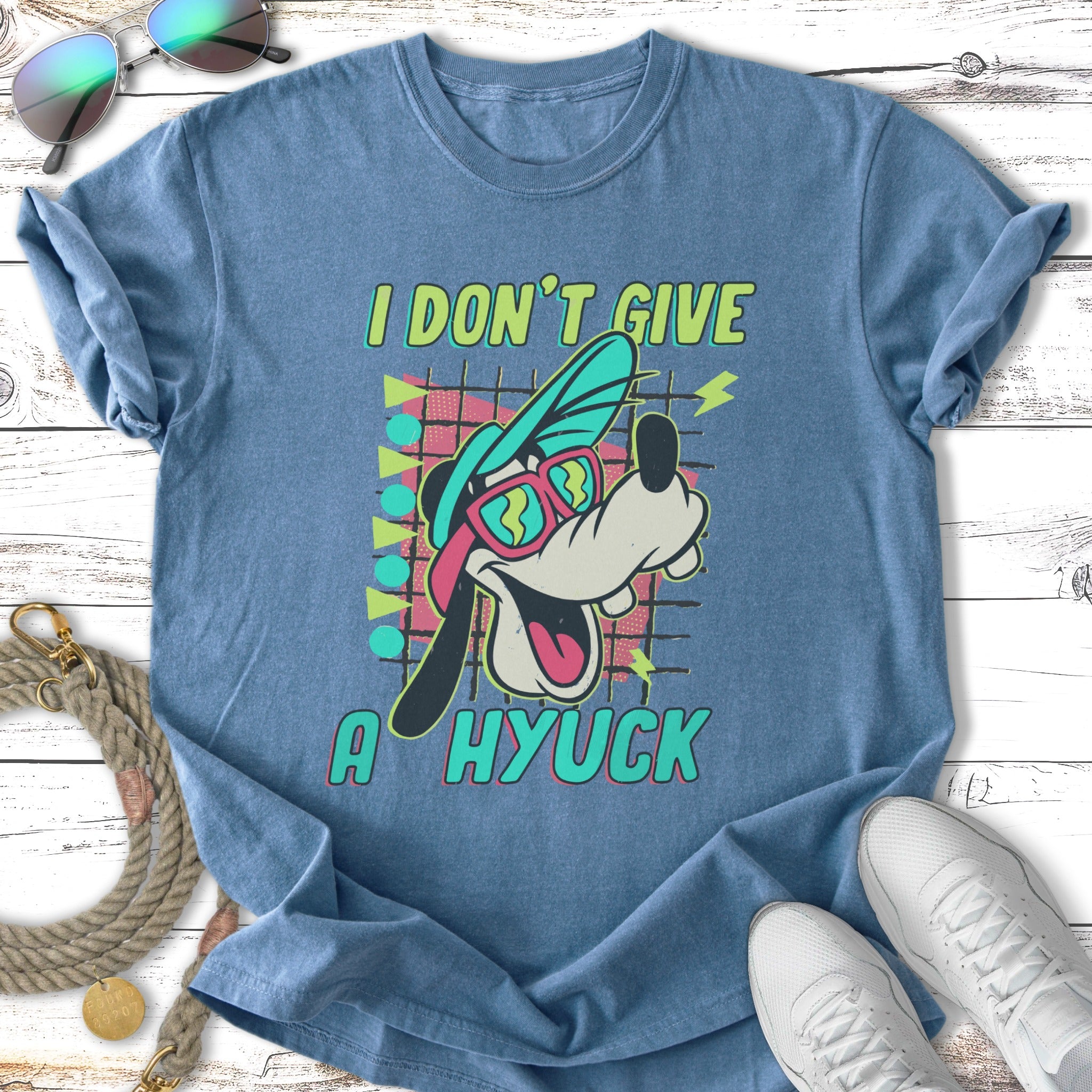 T-shirt with cartoon dog wearing sunglasses and text "I DON'T GIVE A HYUCK."