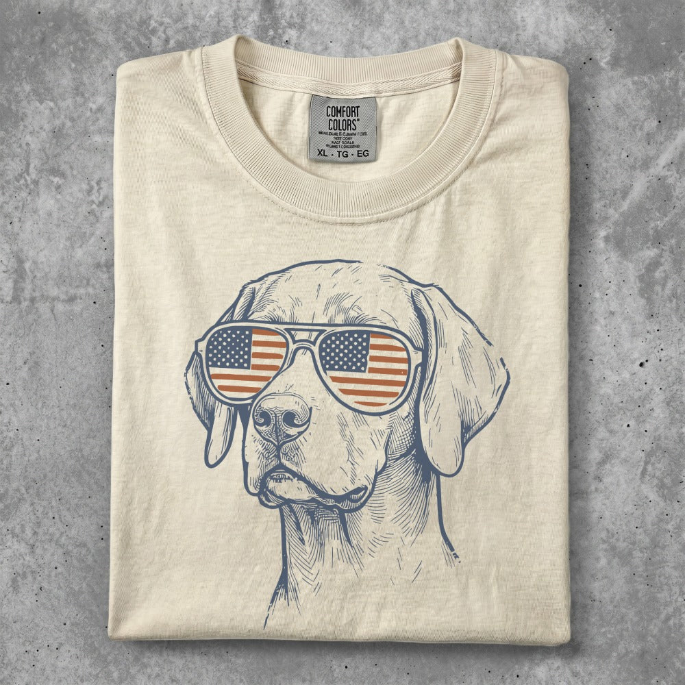 T-shirt with sketch of dog wearing American flag sunglasses.