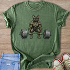 Green t-shirt with illustration of a muscular French bulldog lifting a barbell.
