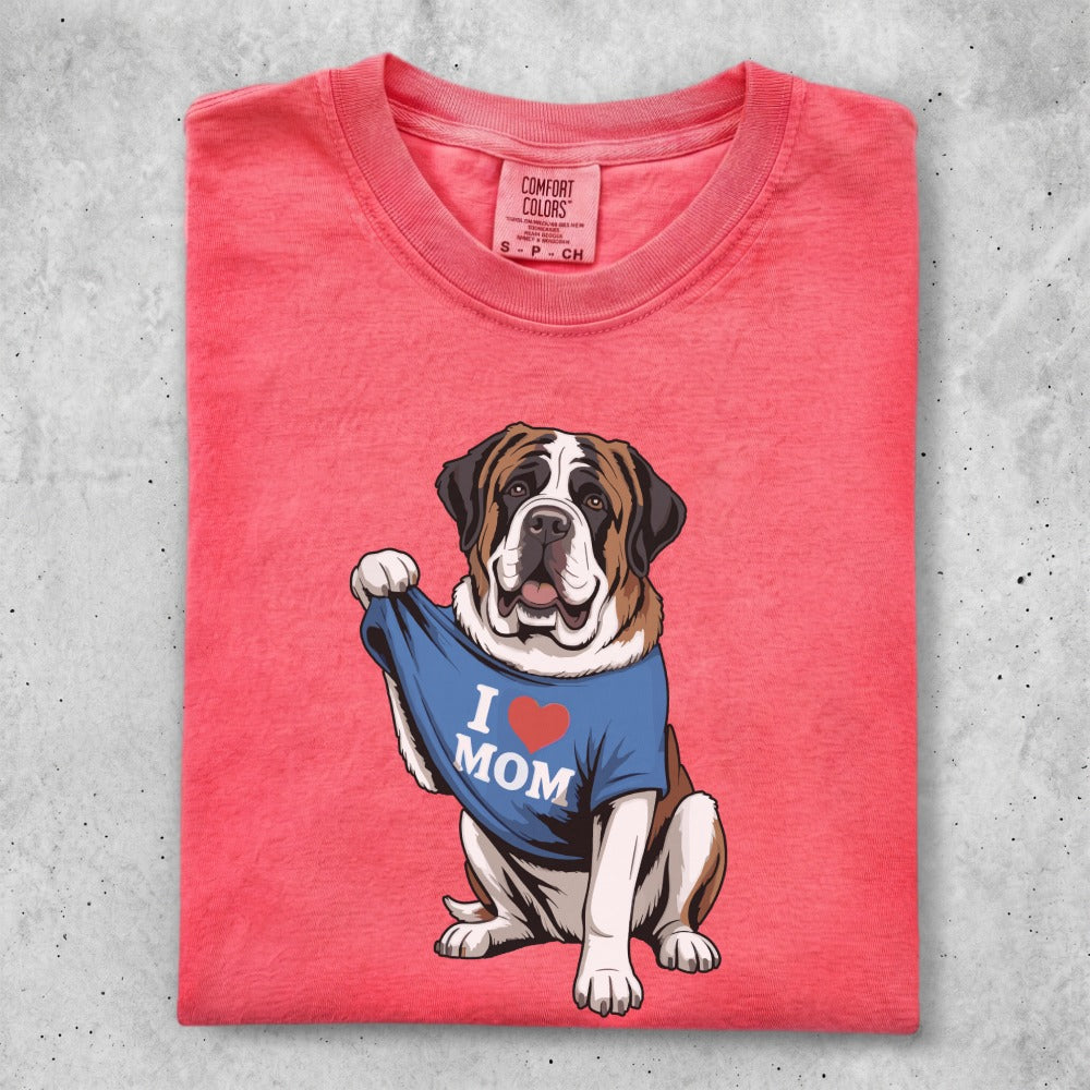St. Bernard dog wearing a blue "I MOM" t-shirt.