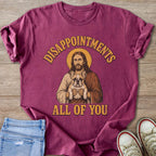 Jesus with halo holds French bulldog, text reads "Disappointments All of You".