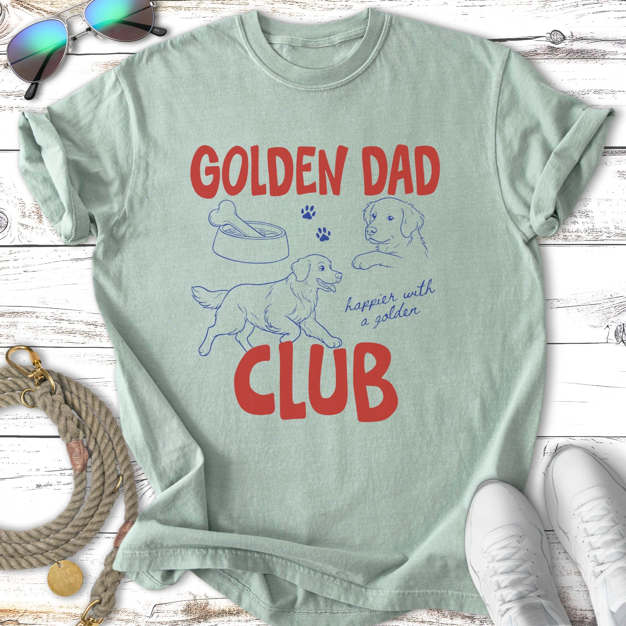 Light green t-shirt with "Golden Dad Club" and dog paw prints.