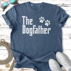 Blue t-shirt with "The Dogfather" text and paw prints.