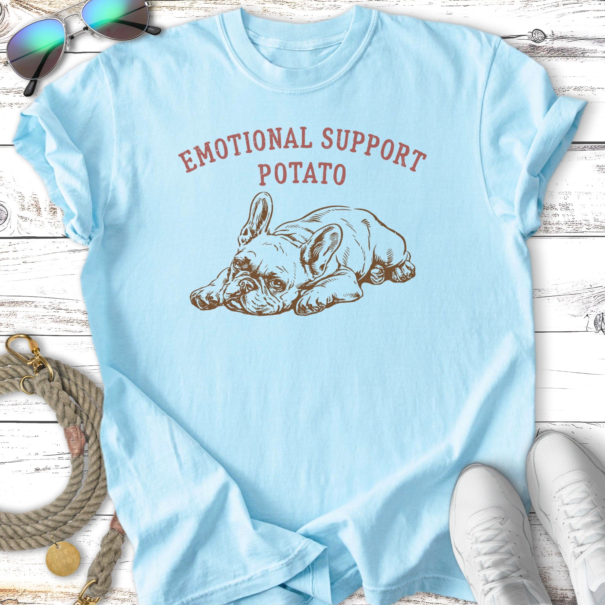 Light blue t-shirt with "Emotional Support Potato" and a French bulldog.