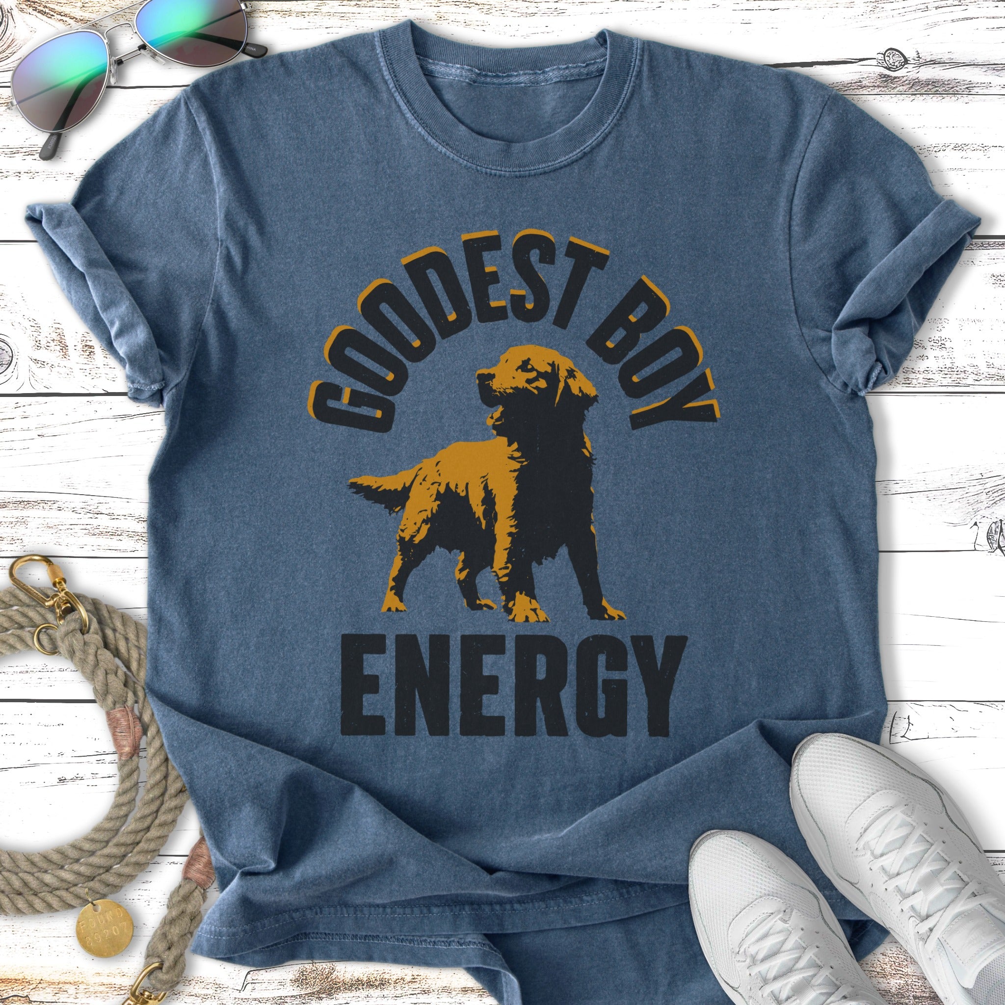 "Goodest Boy" text above a golden retriever on a blue t-shirt.