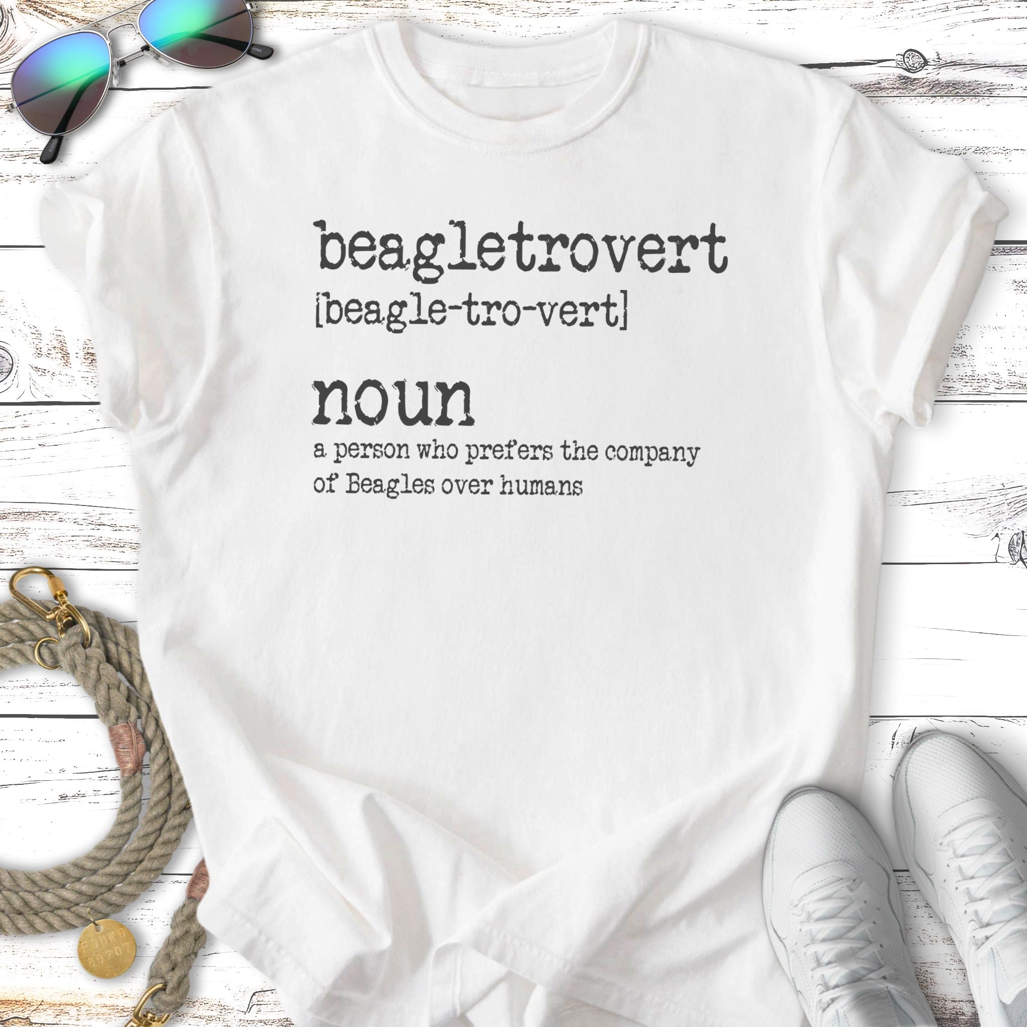 White t-shirt with "beagletrovert [beagle-tro-vert] noun a person who prefers the company of Beagles over humans" text.