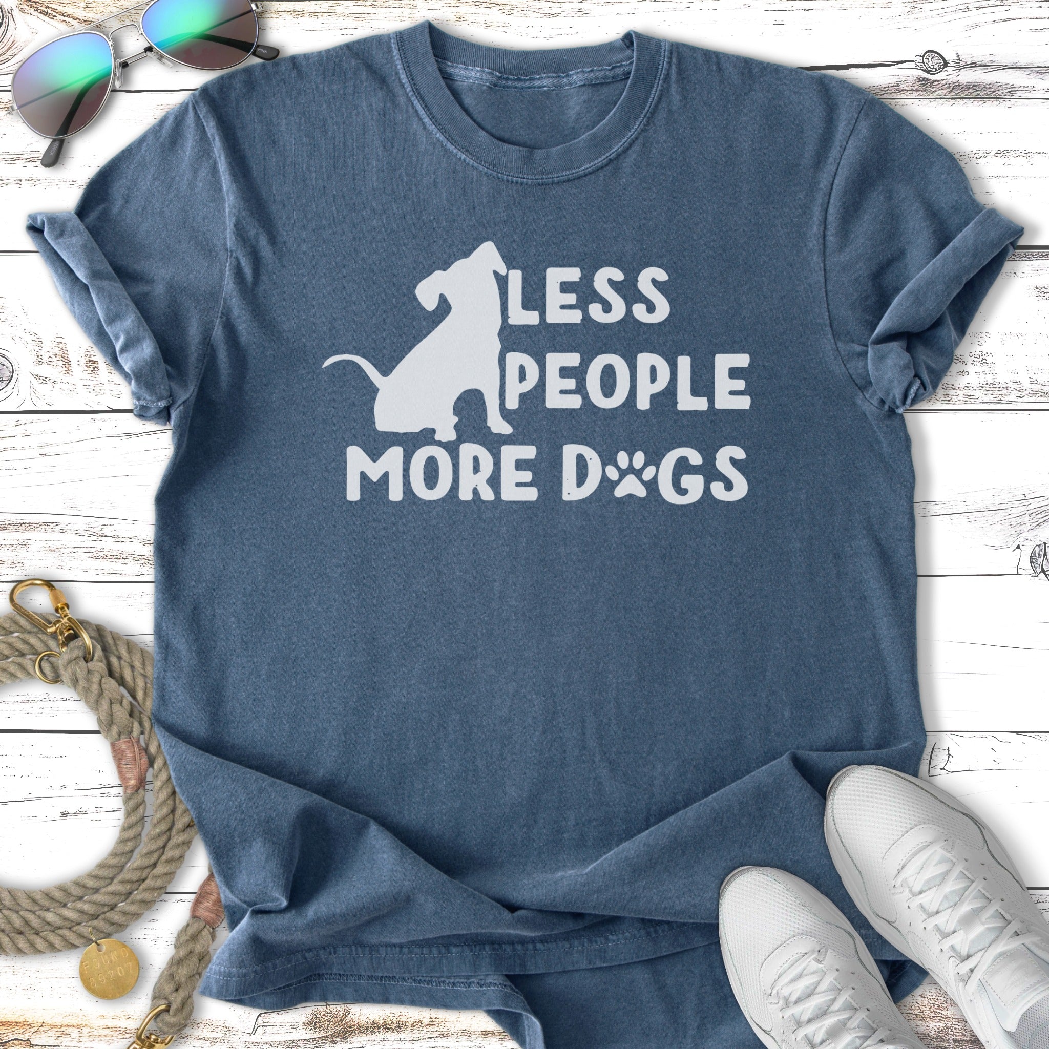 Distressed blue t-shirt with white text "LESS PEOPLE MORE DOGS" and a dog silhouette.