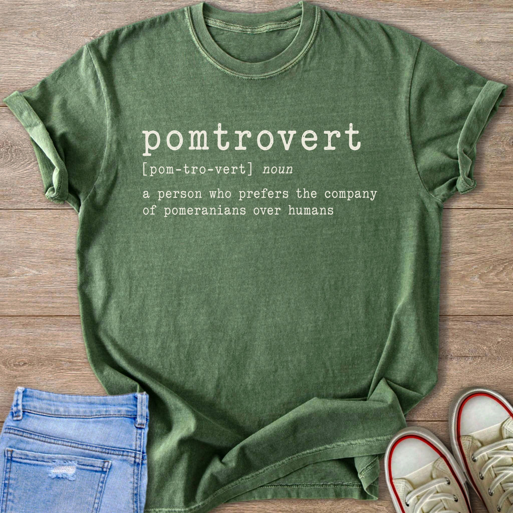 Green t-shirt with "pomtrovert" definition graphic and denim shorts.
