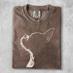 Brown t-shirt with white minimalist cat outline graphic.