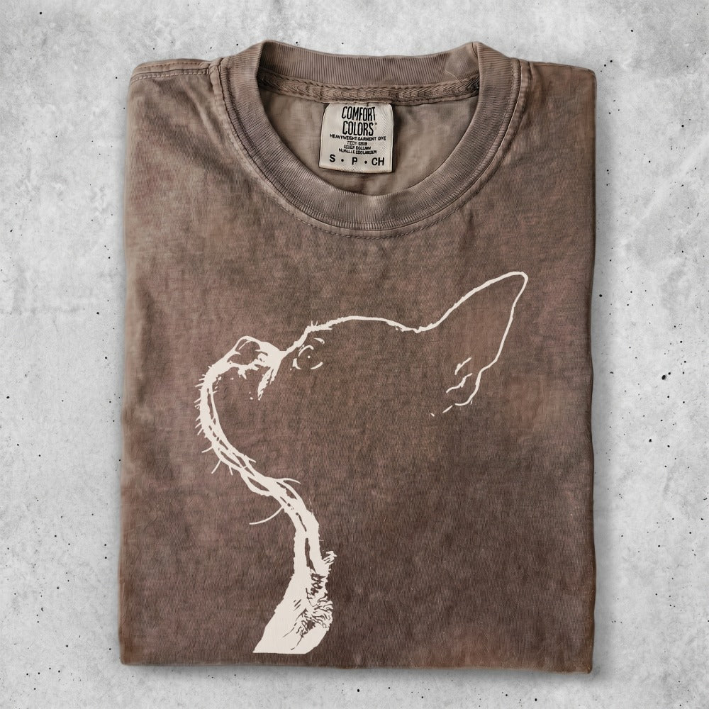 Brown t-shirt with white minimalist cat outline graphic.