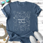 T-shirt with white line drawings of local wildlife and "respect the locals" text.