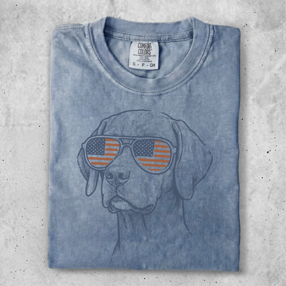 T-shirt with a dog wearing American flag sunglasses.