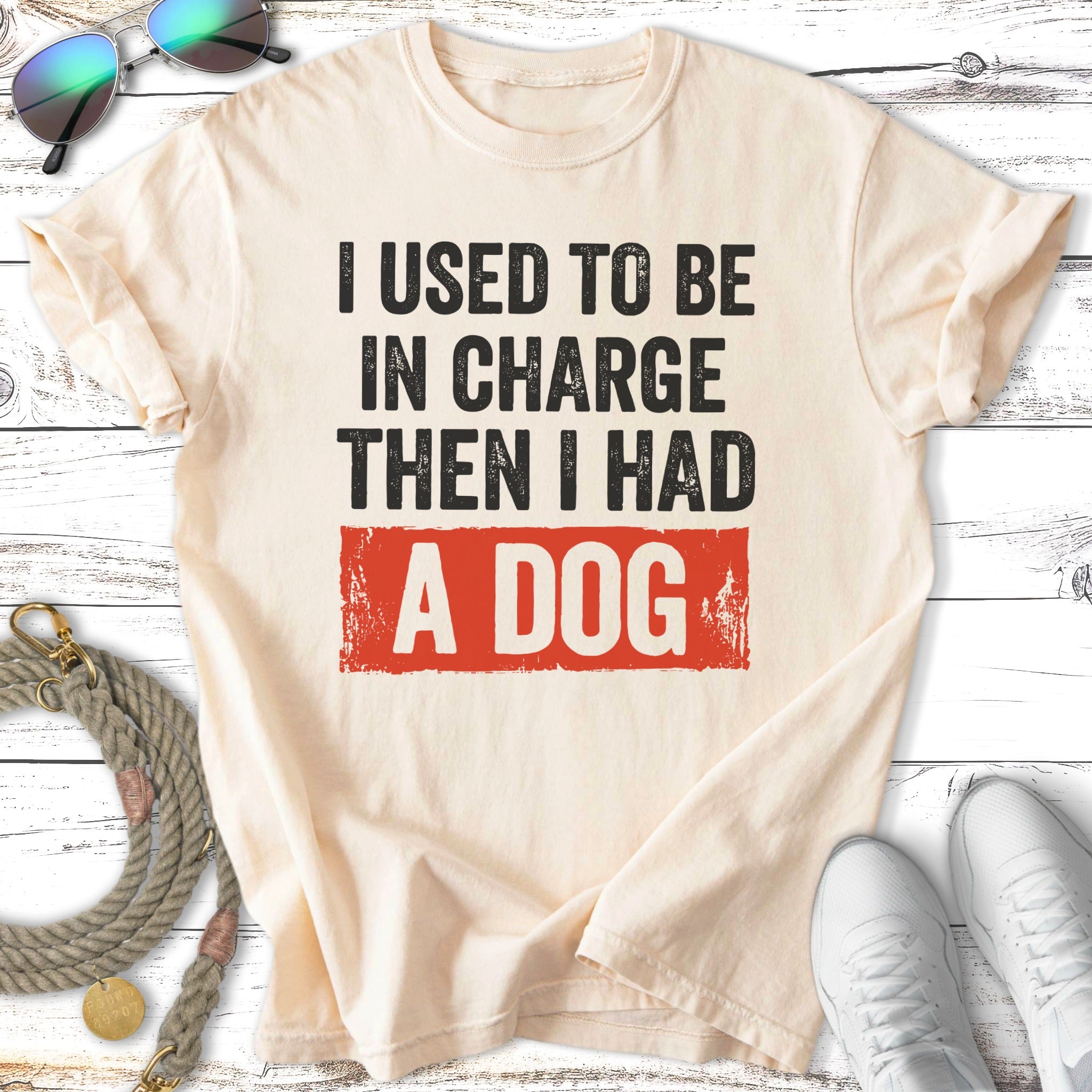 Cream t-shirt with text "I used to be in charge then I had a dog".