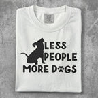White t-shirt with black text "LESS PEOPLE MORE DOGS" and a dog silhouette.