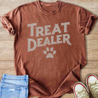 Brown t-shirt with "Treat Dealer" text and a paw print.