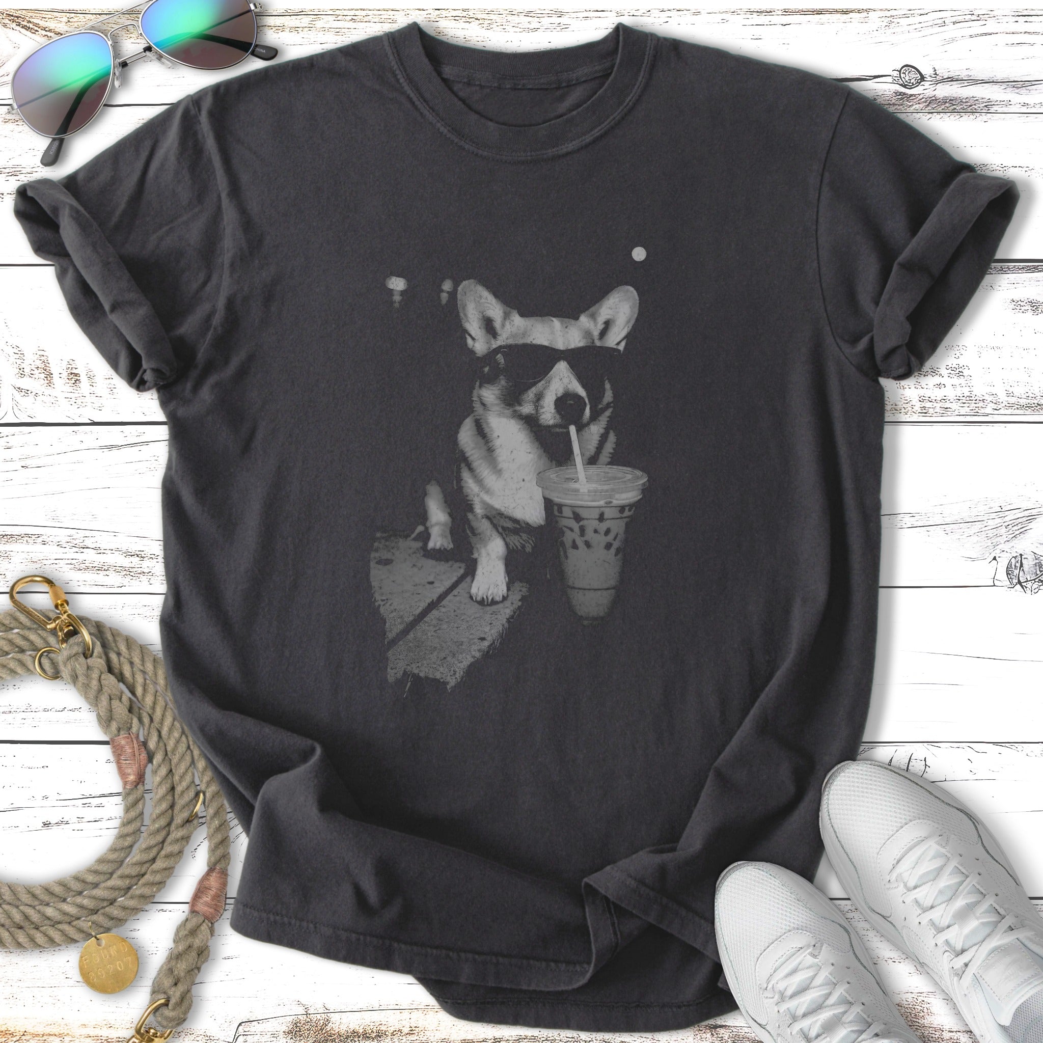 T-shirt with a corgi wearing sunglasses drinking iced coffee.