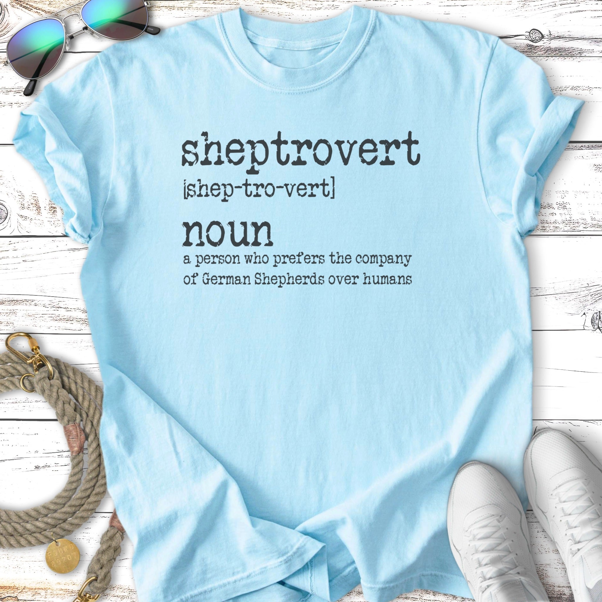 Light blue t-shirt with "Sheptrovert" definition for German Shepherd lovers.