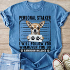 Blue t-shirt with a chihuahua mugshot graphic and text "Personal Stalker".
