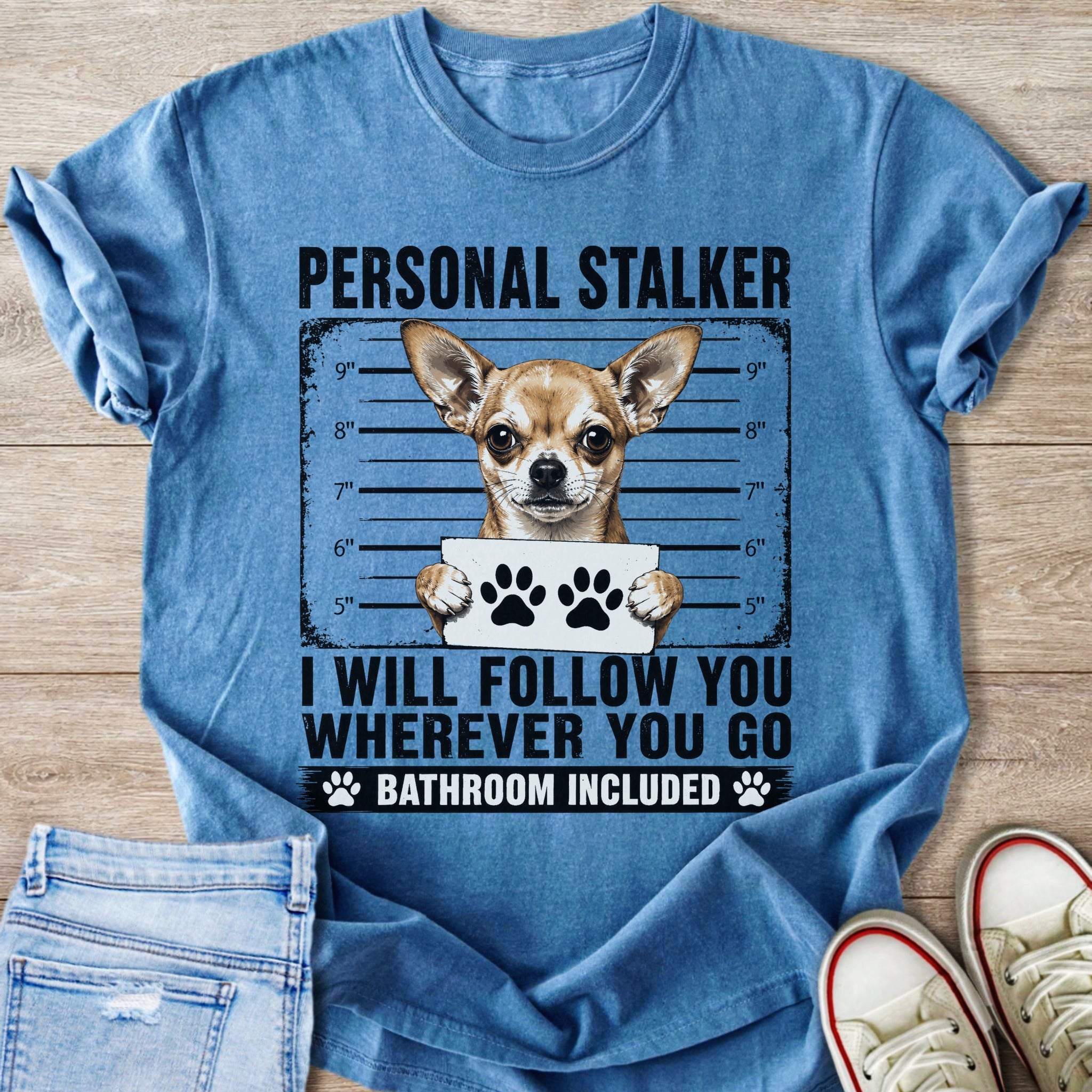 Blue t-shirt with a chihuahua mugshot graphic and text "Personal Stalker".