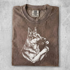 German Shepherd with dandelion on brown Comfort Colors t-shirt.