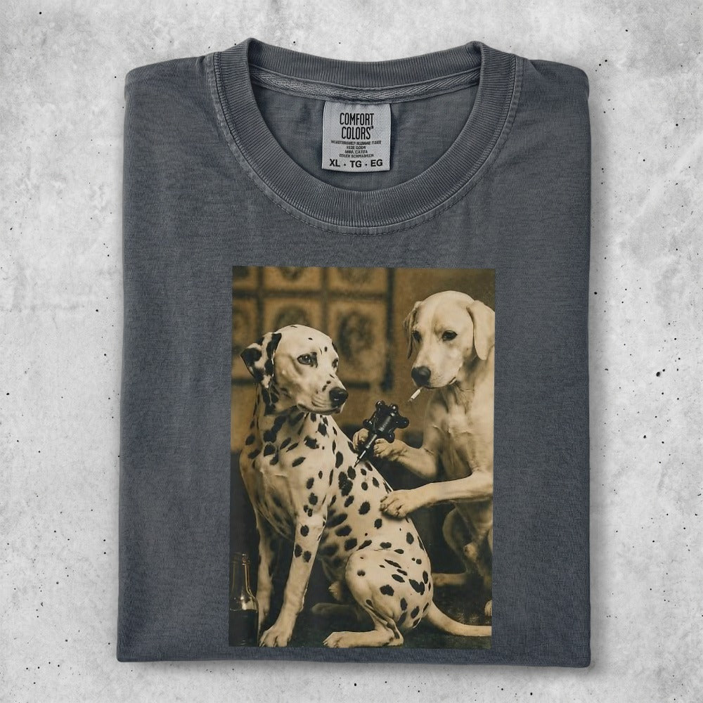Dalmatians and a Labrador retriever tattoo a dog in a vintage-style artwork.