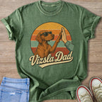 Vizsla dog wearing sunglasses gives a high five with text "Vizsla Dad" below.