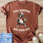 T-shirt graphic of a pug wearing a cowboy hat and holding a gun.