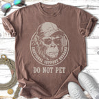 Brown t-shirt with Bigfoot graphic and "Emotional Support Husband Do Not Pet" text.