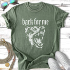 Green t-shirt with "bark for me" and a snarling dog graphic.