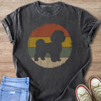 Black t-shirt with a shih tzu silhouette over a retro sun graphic.