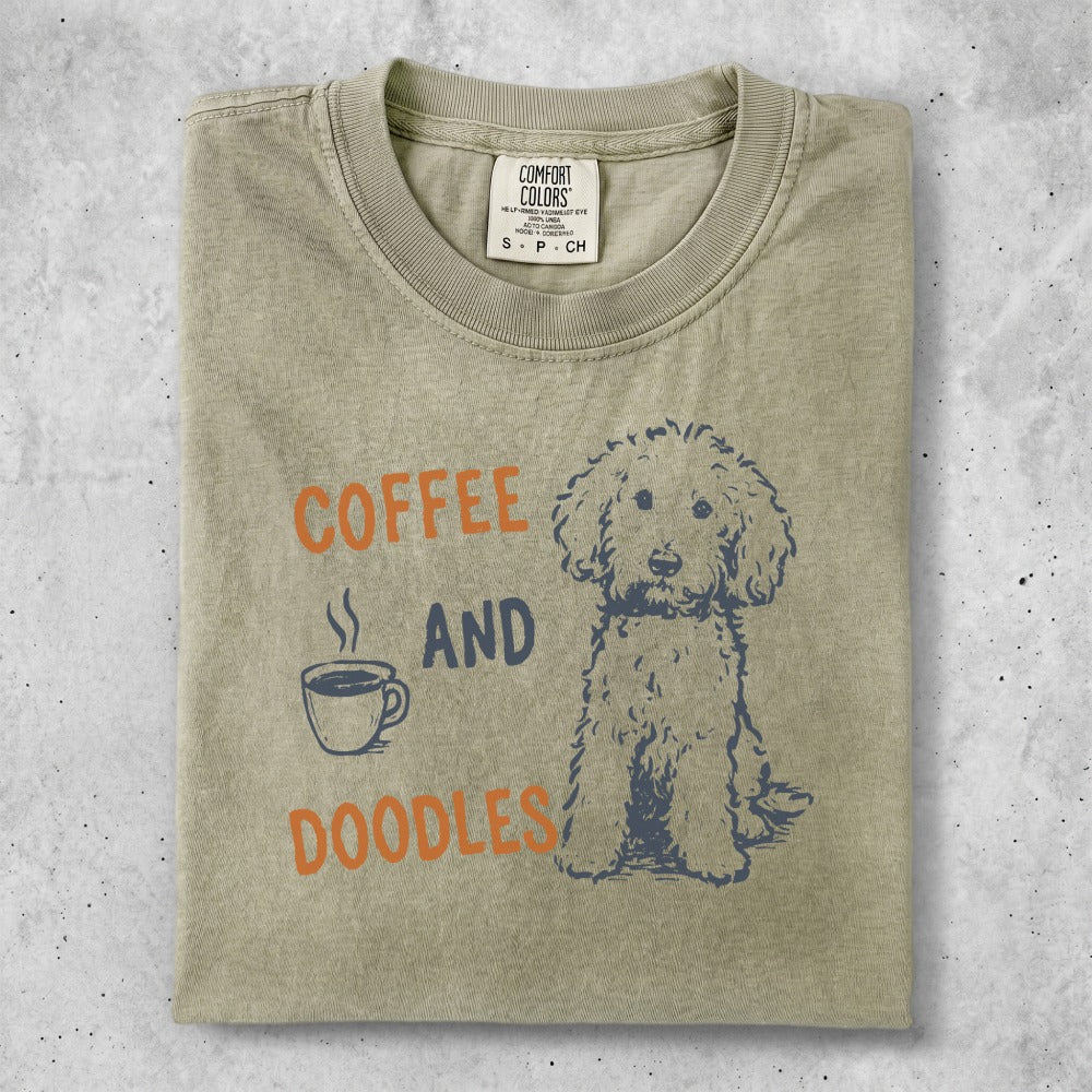 T-shirt with "Coffee and Doodles" text and a doodle dog illustration.