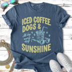 T-shirt with "Iced Coffee, Dogs & Sunshine" text, sunglasses, and drink.