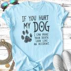 Light blue t-shirt with "If you hurt my dog I can make your death look like an accident" text.