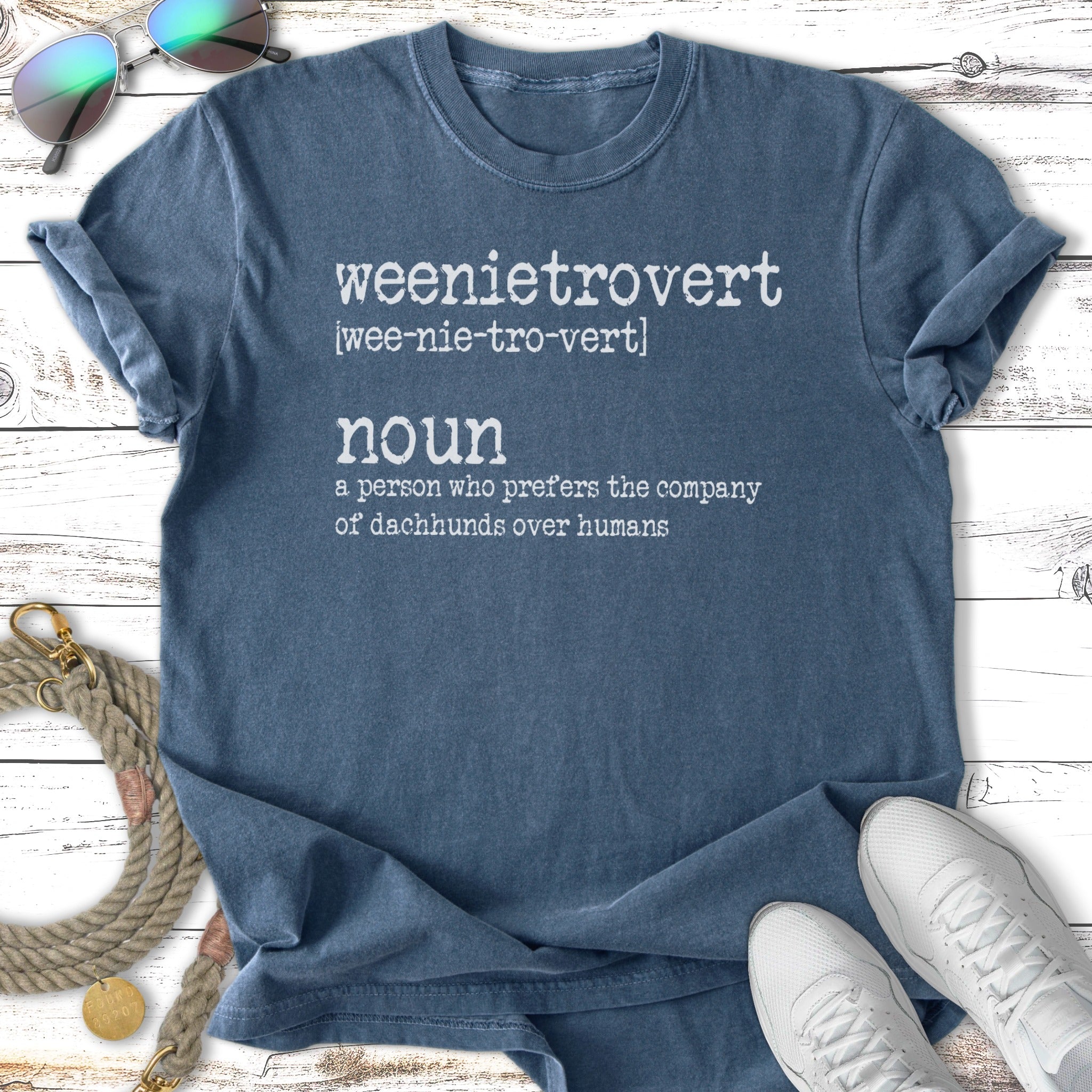 T-shirt with "weenietrovert" definition and dachshund graphic.