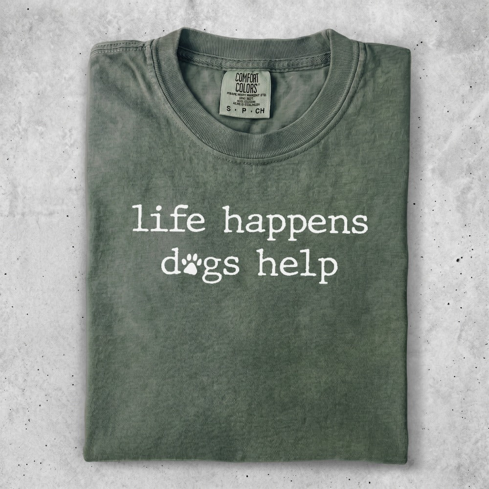 Olive green t-shirt with "life happens dogs help" and paw prints.
