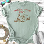 French bulldog with "Emotional Support Potato" text on a pale green t-shirt.