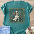 Green t-shirt with Cavalier King Charles Spaniel and floral border design.