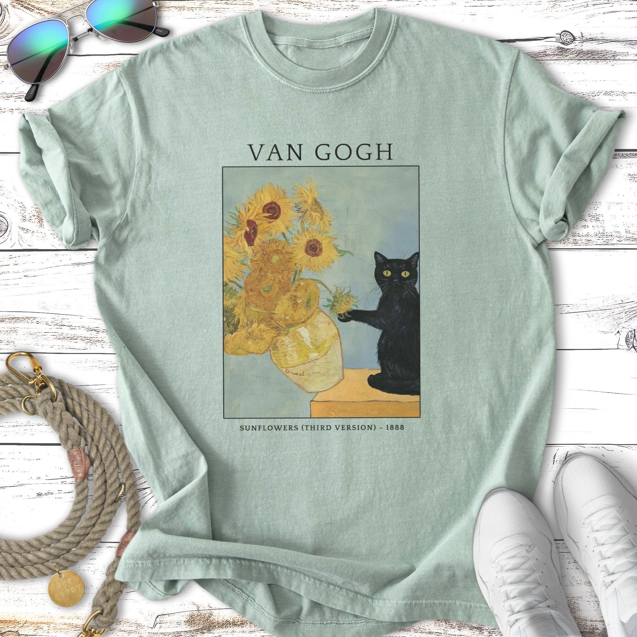 Van Gogh's Sunflowers Third Version with a black cat and text.