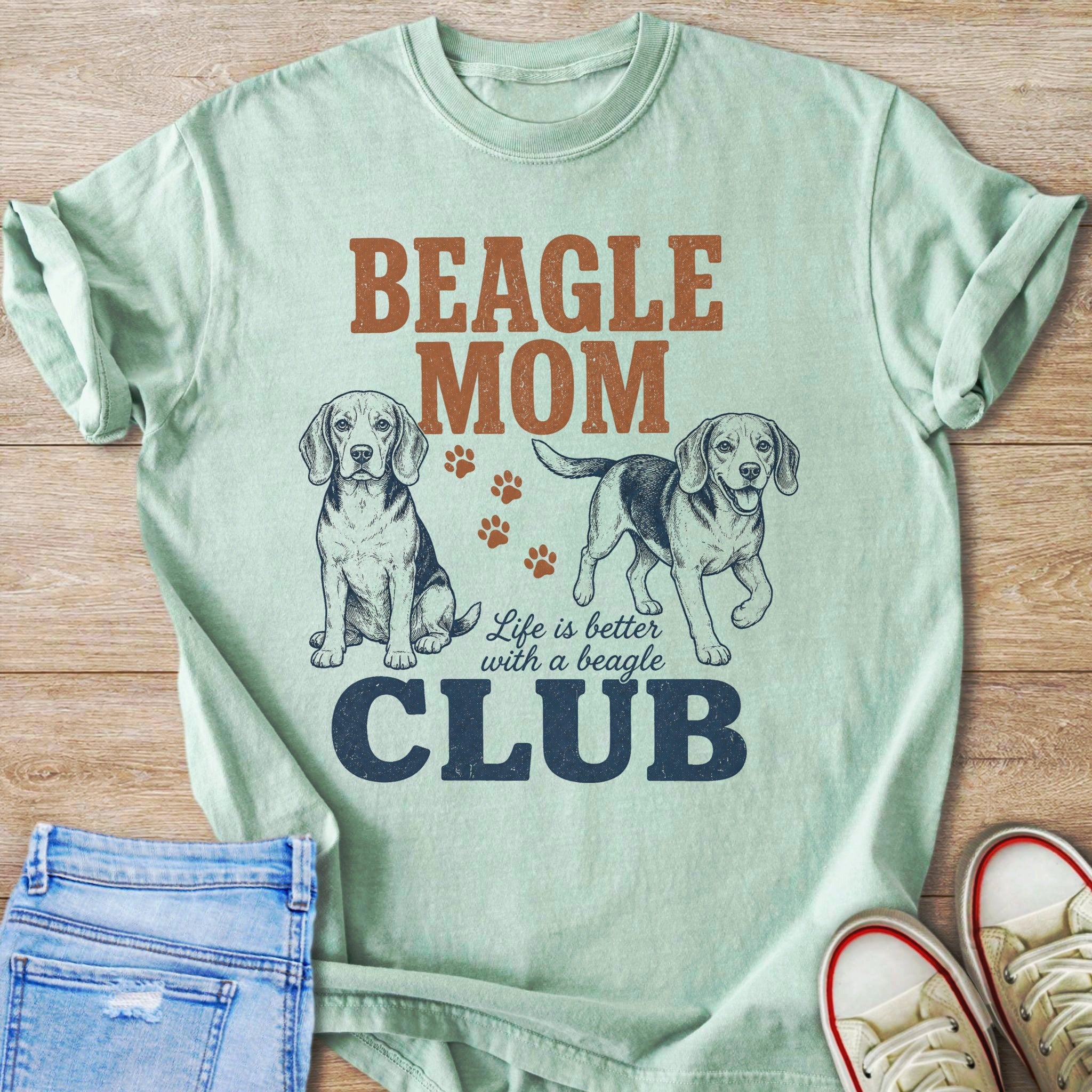 Beagle Mom Club with drawings of two beagles and paw prints.