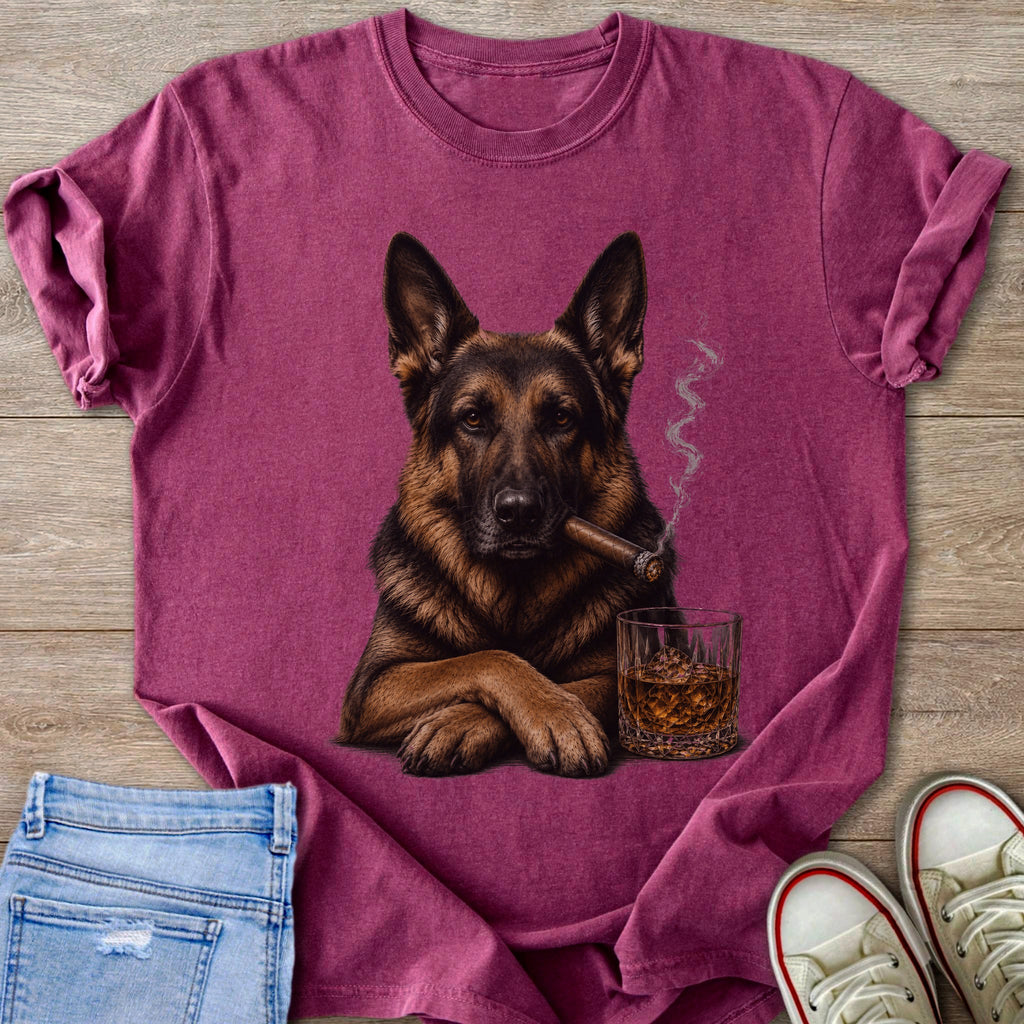German Shepherd with cigar and whiskey glass printed on a burgundy t-shirt.