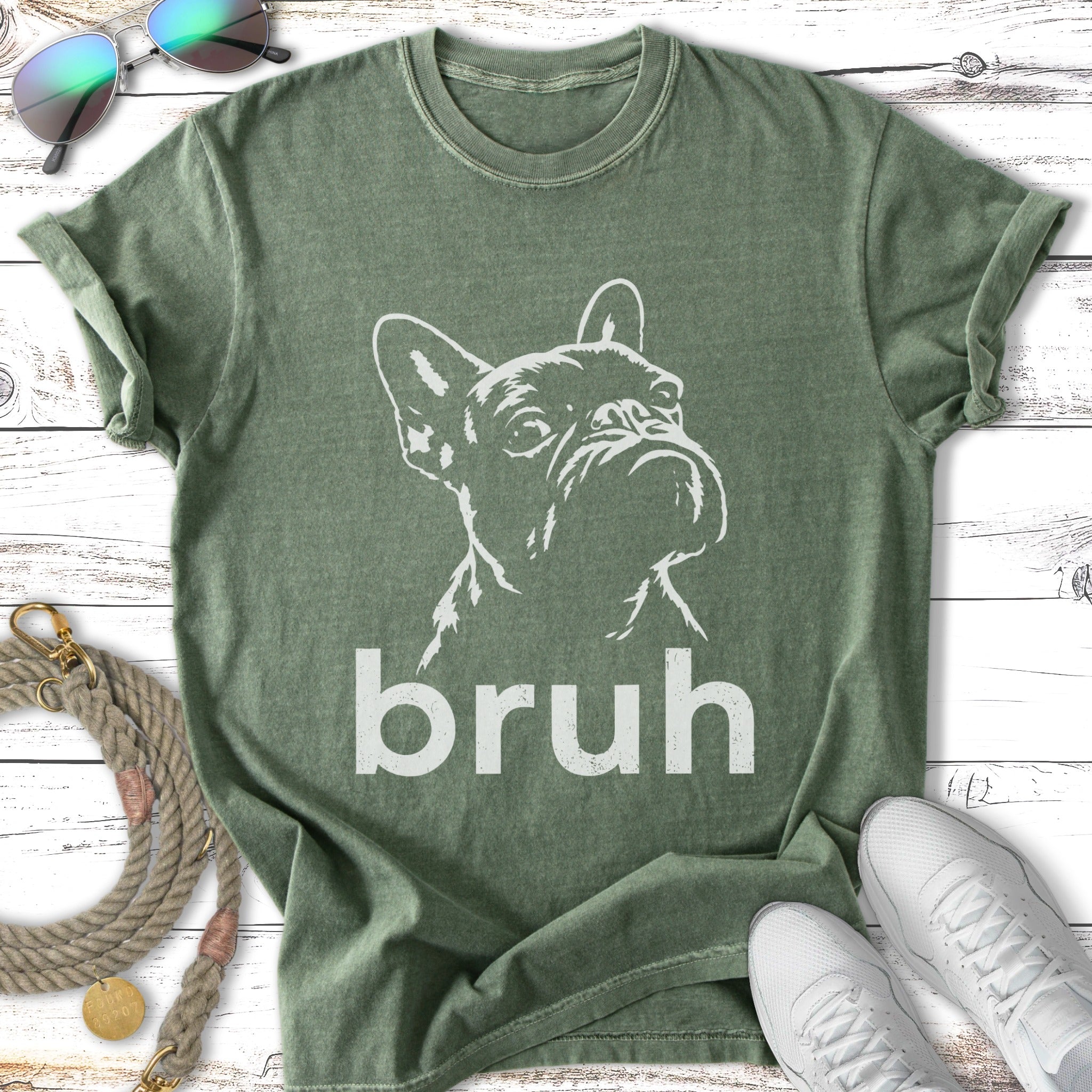 Green t-shirt with white French bulldog graphic and "bruh" text.