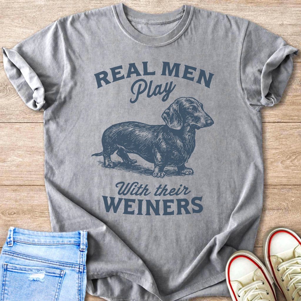 Grey t-shirt with a dachshund graphic and text "Real Men Play With Their W**ners".