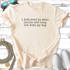 Cream t-shirt with "i just want to make quilts and hang out with my dog" text.