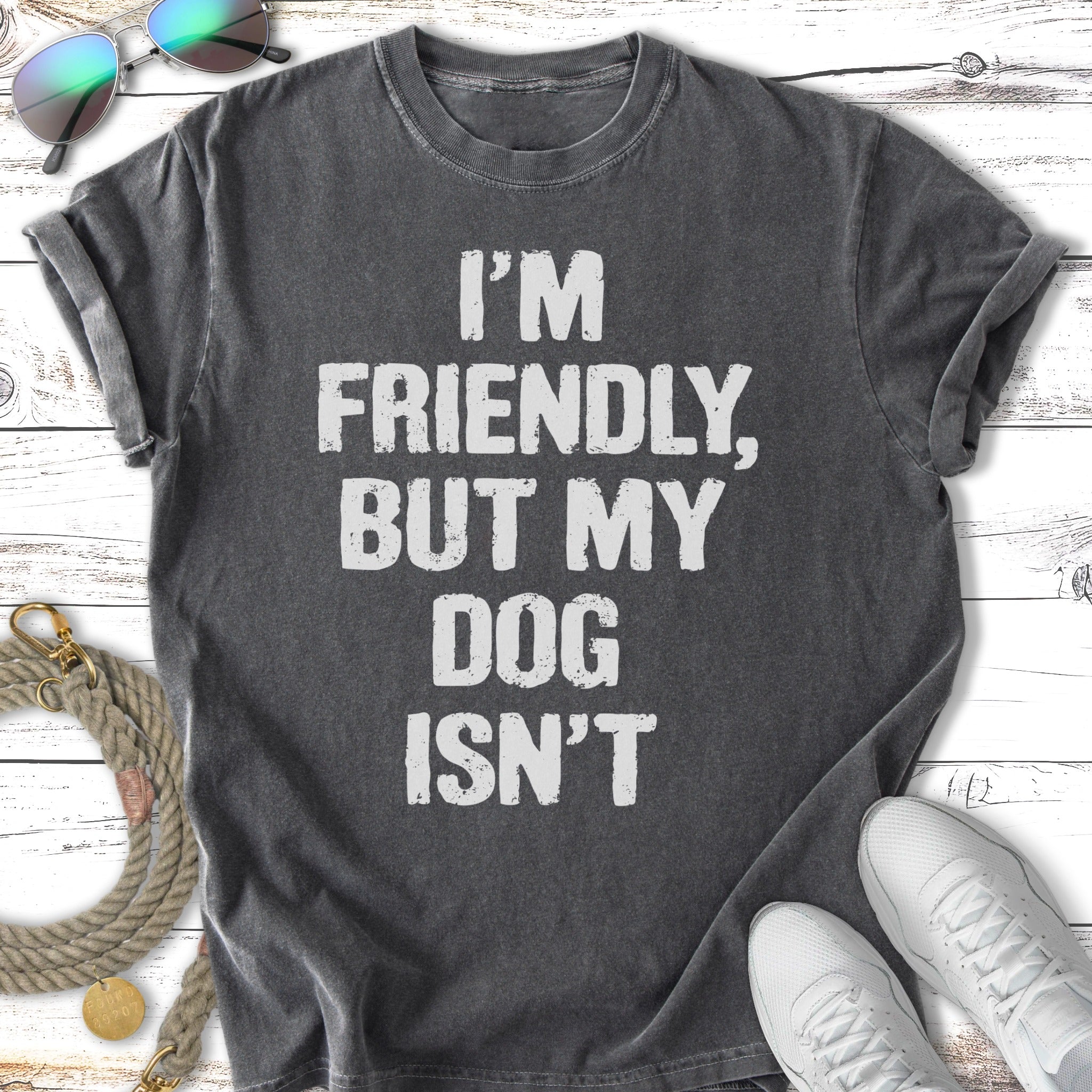 Distressed charcoal t-shirt with "I'M FRIENDLY, BUT MY DOG ISN'T" in white text.