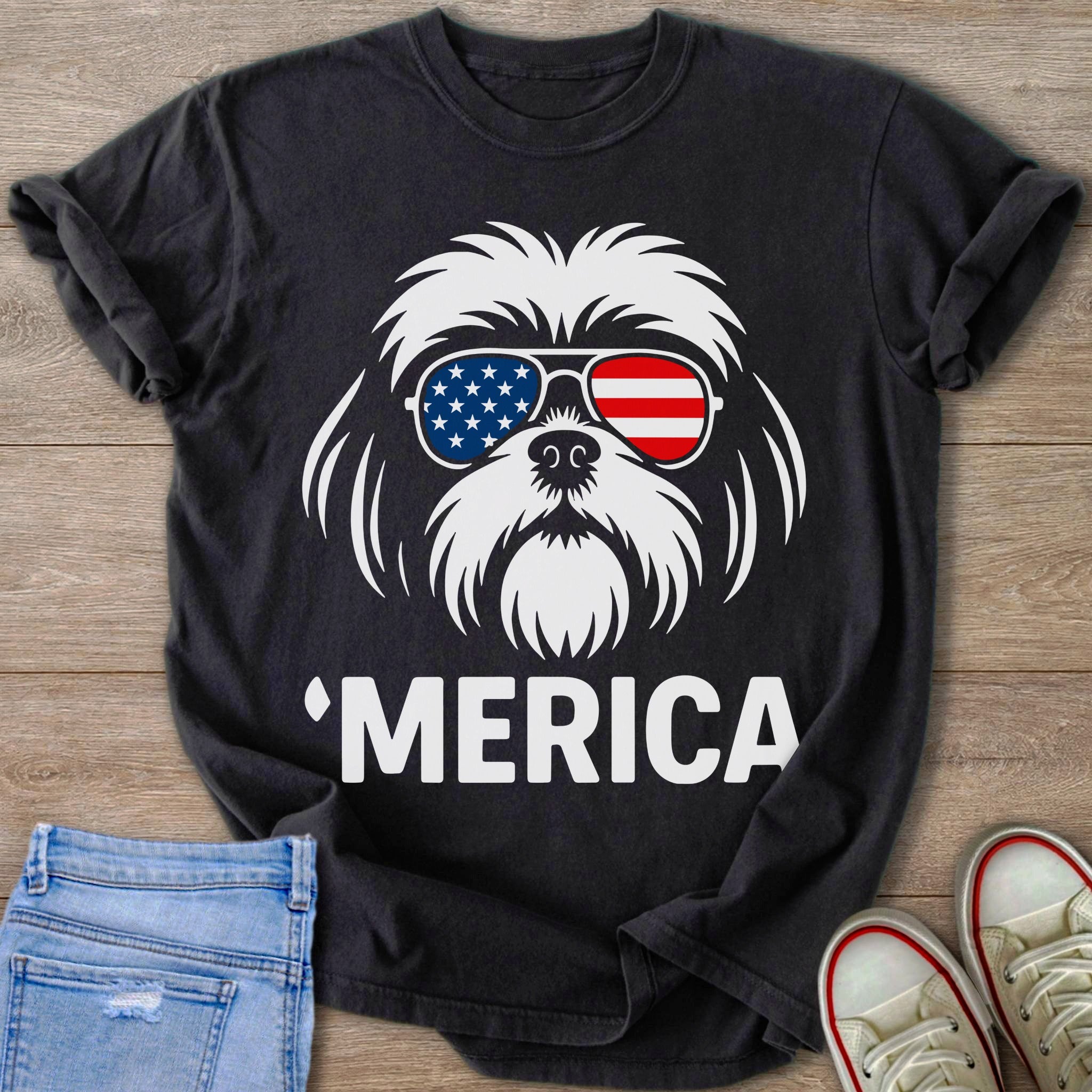 Black t-shirt with white dog graphic wearing American flag sunglasses and "'MERICA" text.